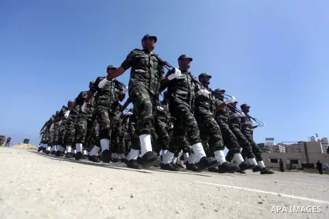 Palestinian members of national security forces march during a graduation ceremony in Gaza City May 21, 2013. Photo by Ashraf Amra