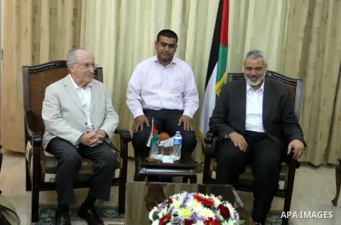 Palestinian Prime Minister in Gaza strip, Ismail Haniyeh receives Head of External Relations former U.S. Henry Siegman in Gaza City, on May 30, 2013. Photo by Mohammed Asad