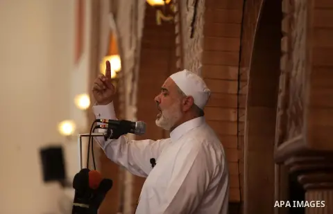 Palestinian Prime Minister Ismail Haniyeh, delivers a speech during Friday prayer in Gaza city on May 31, 2013. Haniyeh described the recent U.S plans as "projects of political deception and fraud". Photo by Ashraf Amra