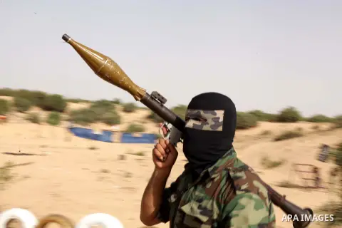 Members of the al-Nasser Salah al-Din Brigades, the military wing of the Popular Resistance Committees, take part in a military exercise refresher, in Khan Younis southern Gaza Strip June 02, 2013 . Photo by Ashraf Amra