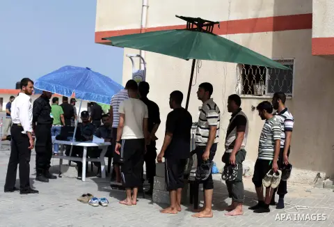 Palestinian applicants undergo a physical examination at a Palestinian recruitment centre in Gaza City June 3, 2013. 100 recruits from 14,000 applicants aged between 18 to 25 will be chosen to join the Palestinian police...