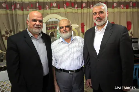 Palestinian Prime Minister in Gaza Strip Ismail Haniyeh meets with Saied Msameh, the member of Palestinian legislative council, before his for treatment travel to turkey. Photo by Ahmed Shaat