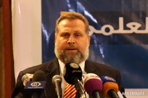 Palestinian Minister of Education Osama al-Muzaini participates in an awards ceremony of scientific research, in Gaza city, on June 11, 2013. Photo by Mohammed Asad