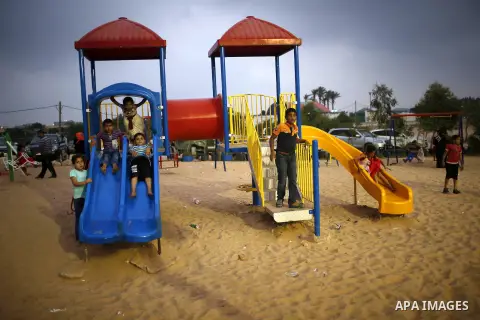 Palestinians play at al-Nour resort in Gaza City June 12, 2013. Al-Nour resort was established on the land of former Jewish settlement of Netzarim where it is open for free for the families of Palestinians whose sons wer...