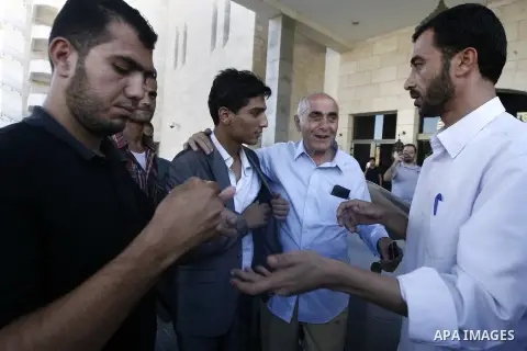 Arab Idol winner Palestinian Mohammed Assaf arrives to the Gaza Strip, on June 25, 2013. Tens of thousands of joyous fans turned out on Tuesday to welcome Assaf on his return to the Gaza Strip and the song contest winner...