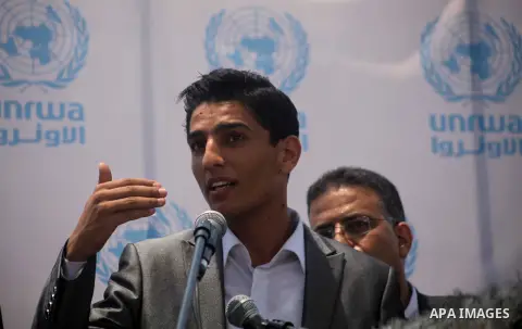 Palestinian winner of "Arab Idol" Mohammed Assaf attends a press conference at the UNRWA Headquarters in Gaza City on June 26, 2013. Filippo Grandi, Commissioner General of the United Nations Relief and Works Agency (UNR...