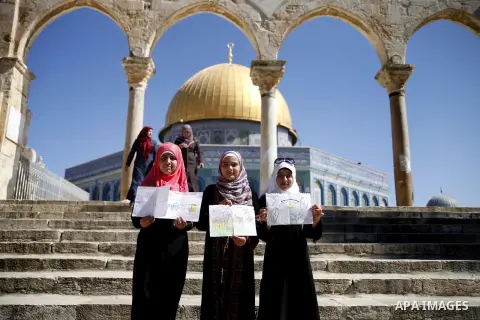 Palestinian children participate in summer camps at Al-Aqsa mosque in the old city of Jerusalem on June 27, 2013. Photo by Saeed Qaq