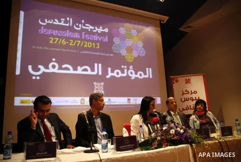 Palestinians hold a press conference ahead the opening of the annual Jerusalem festival named "al-Quds the luminous city of culture" in Jerusalem, June 27, 2013. Photo by Saeed Qaq