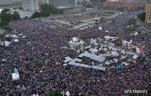Egyptian opponents take part in a protest demanding that Egyptian President Mohamed Mursi resign at Tahrir Square in Cairo July 1, 2013. Egypt's military on Monday issued a 48-hour ultimatum to the Islamist president and...