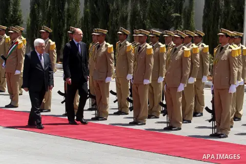 Italian Prime Minister, Enrico Letta during the welcome ceremony at the Palestinian President Mahmoud Abbas headquarter in the West bank town of Ramallah, upon his arrival for a meeting with the Palestinian President , o...