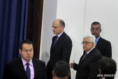 Italian Prime Minister, Enrico Letta during his joint press conference with the Palestinian President Mahmoud Abbas at Abbas' headquarters in the West bank town of Ramallah, on 02 July 2013. Photo by Issam Rimawi