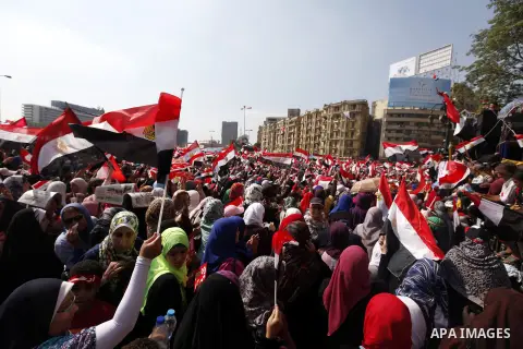 Egyptian female protesters take part in a protest against President Morsi, in Tahrir square, Cairo, Egypt, 02 July 2013. Islamist President Mohamed Morsi on 02 July criticized an ultimatum by the Egyptian military to res...