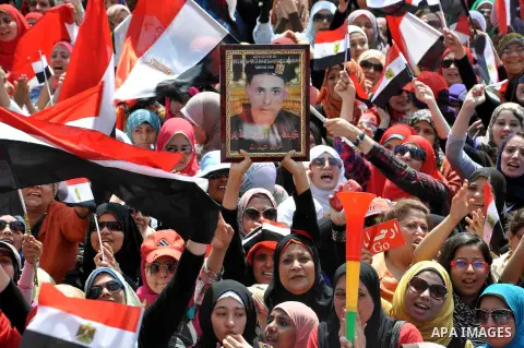 Egyptian female protesters take part in a protest against President Morsi, in Tahrir square, Cairo, Egypt, 02 July 2013. Islamist President Mohamed Morsi on 02 July criticized an ultimatum by the Egyptian military to res...