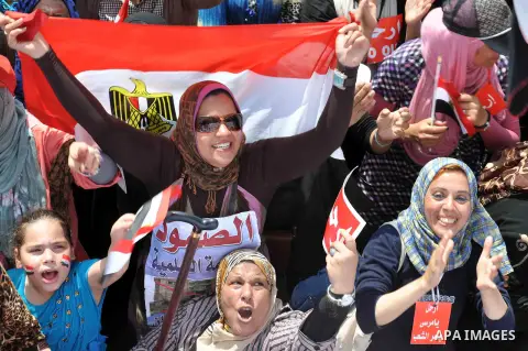 Egyptian female protesters take part in a protest against President Morsi, in Tahrir square, Cairo, Egypt, 02 July 2013. Islamist President Mohamed Morsi on 02 July criticized an ultimatum by the Egyptian military to res...