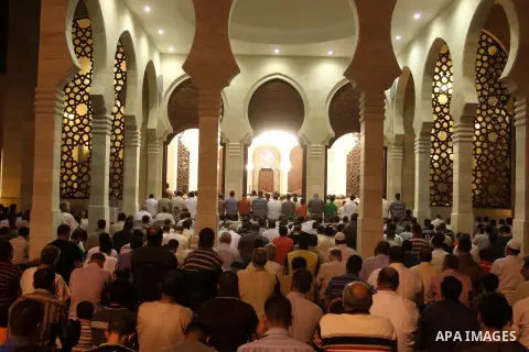 Palestinian Muslims perfom praying Taraweeh in al Khaldi mosque in Gaza city, after breaking the fast on the Third day of the Moslem holy month of Ramadan on July 12, 2013. Photo by Mohammed Asad