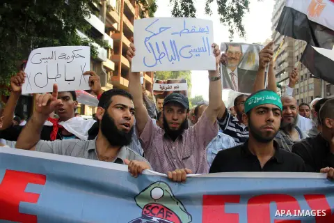 Members of the Muslim Brotherhood and supporters of deposed Egyptian President Mohamed Mursi take part in a rally against Egyptian Minister of Defense Abdel-Fattah al-Sisi, in Cairo, July 15, 2013. The first senior U.S....