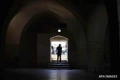A Palestinian man enters al-Omari a mosque during the holy month of Ramadan in Gaza City, Gaza Strip, 23 July 2013. Muslims around the world are observing the holy fasting month of Ramadan in which they refrain from eati...