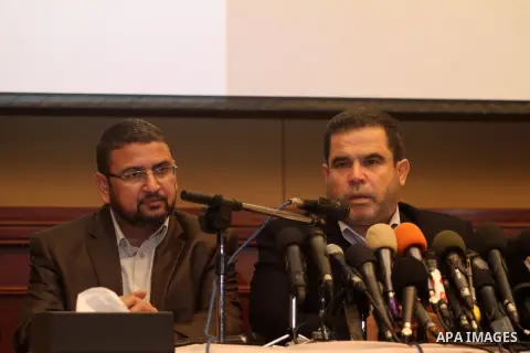 Palestinian Hamas leaders participate in a press conference in Gaza city on July 30, 2013. Hamas leader Salah al-Bardawil exposes what Hamas says it is documents condemns some of Palestinians who belong to Fatah movement...