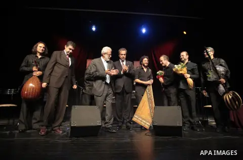 Turkish Ambassador Sakir Ozkan Torunlar and Palestinian Minister of Culture Anwar Abu Aisha attend the concert of Turkish musical band 'Istanbul' in Jerusalem on Aug 22, 2013. The concert organized in collaboration with...