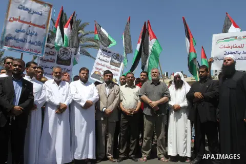 Palestinian leaders of Hamas and Islamic Jehad take part in a protest against Palestinian-Israeli negotiations on August 23, 2013, in Gaza City. A senior Palestinian official accused on August 23 Israel of preventing the...