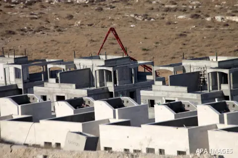 A picture shows the construction site in Pisgat Zeev, an urban settlement in an area Israel annexed to Jerusalem after capturing it in the 1967 Middle East war, near the Arab village of Beit Hanina, August 25, 2013. Pale...