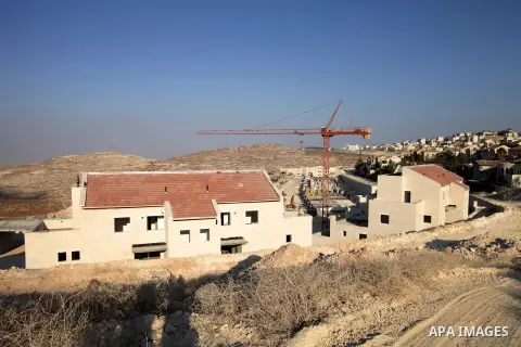 A picture shows the construction site in Pisgat Zeev, an urban settlement in an area Israel annexed to Jerusalem after capturing it in the 1967 Middle East war, near the Arab village of Beit Hanina, August 25, 2013. Pale...