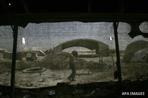 A Palestinian tunnel man works outside a smuggling tunnel dug beneath the Gaza-Egypt border in the southern Gaza Strip on August 27, 2013. Egyptian security forces have stepped up a crackdown campaign on smuggling tunnel...