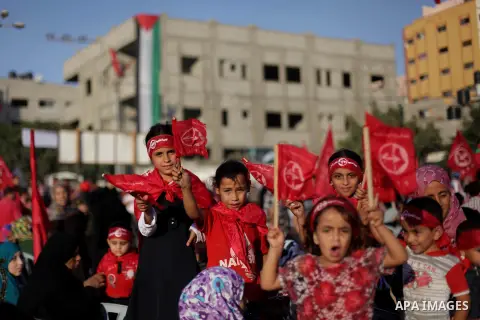 Palestinian supporters of Popular Front for the Liberation of Palestine (PFLP) take part in a rally marking the 12th anniversary of the killing of Abu Ali Mustafa, leader of (PLFP), in Gaza City August 27, 2013. Abu Must...