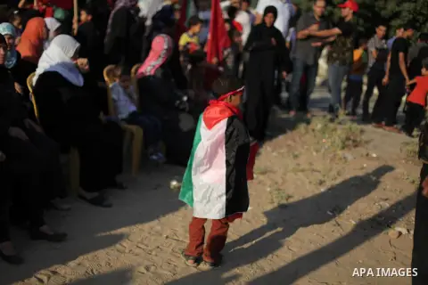 Palestinian supporters of Popular Front for the Liberation of Palestine (PFLP) take part in a rally marking the 12th anniversary of the killing of Abu Ali Mustafa, leader of (PLFP), in Gaza City August 27, 2013. Abu Must...