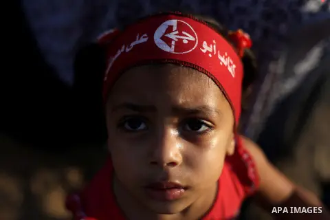 Palestinian supporters of Popular Front for the Liberation of Palestine (PFLP) take part in a rally marking the 12th anniversary of the killing of Abu Ali Mustafa, leader of (PLFP), in Gaza City August 27, 2013. Abu Must...