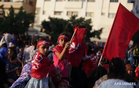 Palestinian supporters of Popular Front for the Liberation of Palestine (PFLP) take part in a rally marking the 12th anniversary of the killing of Abu Ali Mustafa, leader of (PLFP), in Gaza City August 27, 2013. Abu Must...
