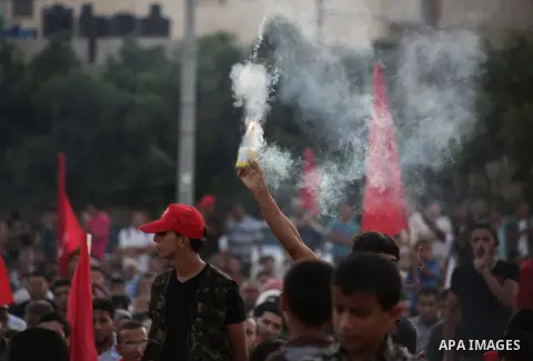 Palestinian supporters of Popular Front for the Liberation of Palestine (PFLP) take part in a rally marking the 12th anniversary of the killing of Abu Ali Mustafa, leader of (PLFP), in Gaza City August 27, 2013. Abu Must...