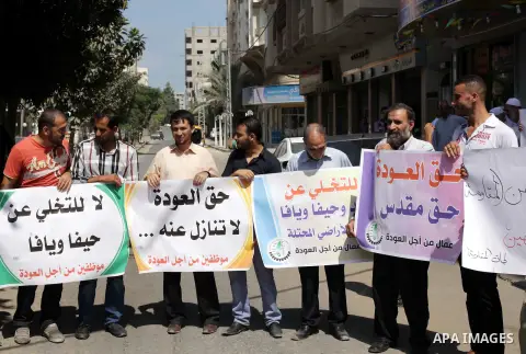Palestinians take part a protest during a demonstration against the Palestinian-Israeli negotiations as they try to march towards headquarters of Palestinian president Mahmud Abbas, in the Gaza on Aug. 29, 2013. Israeli...