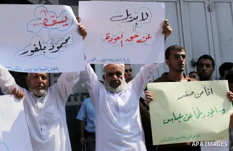 Palestinians take part a protest during a demonstration against the Palestinian-Israeli negotiations as they try to march towards headquarters of Palestinian president Mahmud Abbas, in the Gaza on Aug. 29, 2013. Israeli...