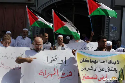 Palestinians take part a protest during a demonstration against the Palestinian-Israeli negotiations as they try to march towards headquarters of Palestinian president Mahmud Abbas, in the Gaza on Aug. 29, 2013. Israeli...