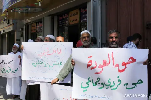 Palestinians take part a protest during a demonstration against the Palestinian-Israeli negotiations as they try to march towards headquarters of Palestinian president Mahmud Abbas, in the Gaza on Aug. 29, 2013. Israeli...