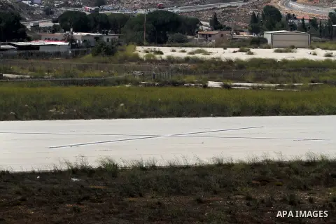 A picture shows the site of Atarot airport in the Qalandia area in northern Jerusalem on August 29, 2013. Israeli forces on Wednesday started maintenance operations at Atarot airport which has been closed since the outbr...