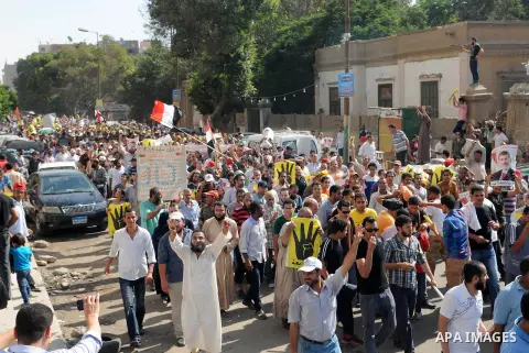 Supporters of the Muslim Brotherhood and Egypt's toppled president Mohamed Morsi demonstrate in Cairo on August 30, 2013. Several thousand Egyptians protested in Cairo in support of ousted president Mohamed Morsi, their...
