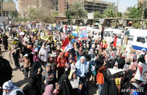 Supporters of the Muslim Brotherhood and Egypt's toppled president Mohamed Morsi demonstrate in Cairo on August 30, 2013. Several thousand Egyptians protested in Cairo in support of ousted president Mohamed Morsi, their...