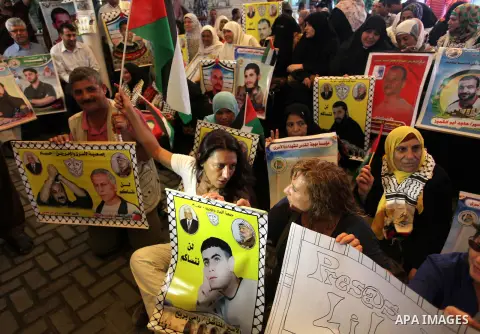 Delegation of the Spanish take part in a protest calling for the release of Palestinian prisoners held in Israeli jails in Gaza City on Sep. 02, 2013. Photo by Ashraf Amra