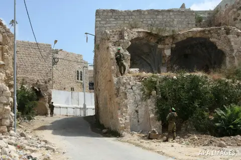 Israeli security forces stand guard outside the Ibrahimi mosque 'Tomb of the Patriarchs' in the West Bank City of Hebron on Sept. 05, 2013. Israeli authorities closed the roads leading to the Ibrahimi Mosque to Palestini...