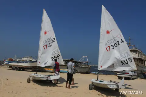 Palestinian youths prepare ther sailboats to sailing at the beach of Gaza City on Sept. 05, 2013. Members of the sail club try to revive the sport that was popular in the 1960s and 1970s, but has dropped off in the inter...