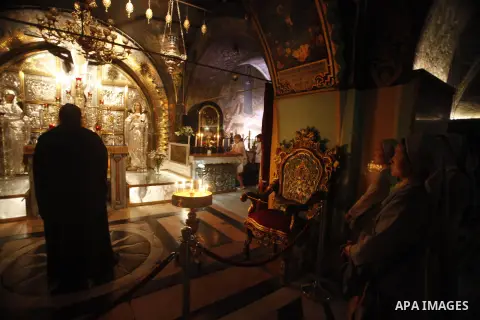 Christian worshipers pray at the Church of the Holy Sepulchre in Jerusalem's Old City, Sept. 08, 2013. The Church of the Holy Sepulchre is one of the most Holy sites in the Christian world and its site in Jerusalem is id...