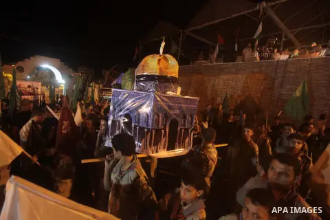 Palestinian Hamas supporters hold movement flags during a rally marking 13th anniversary of the so-called Al-Aqsa uprising or 'Second Intifada', and against visits to a disputed Jerusalem holy site by religious Jews, cla...