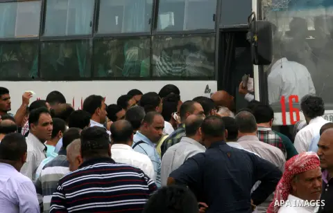 Palestinians wait at the Rafah border crossing in the southern Gaza Strip on September 28, 2013, for a brief opening allowing special cases to cross after Egyptian authorities closed the crossing "indefinitely" the day b...