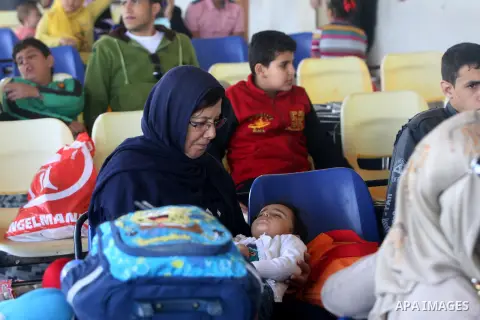 Palestinian travelers wait to cross into Egypt at the Rafah crossing terminal in the southern Gaza Strip on the border with Egypt on October 08, 2013. Hundreds of patients, students and foreign residents from the Palesti...