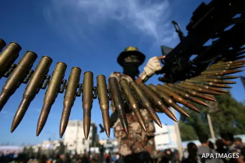 A Palestinian militant of Jihad Islamic movement takes part in a rally marking the 18th anniversary of the killing of Fathi al-Shiqaqi, the movement's founder, in Rafah in the southern Gaza Strip Oct. 24, 2013. al-Shiqaq...