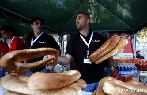 Palestinians take part in the annual Jerusalem's cakes festival in the east Jerusalem neighborhood of Sheikh Jarrah, Oct. 27, 2013. The Jerusalem's cakes festival is an annual carnival that inviting Palestinian children,...
