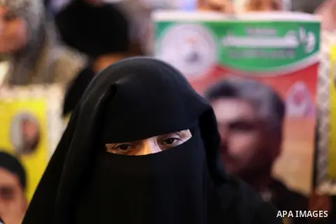 Palestinian women take part in a protest demanding the release of all Palestinian prisoners held in Israeli jails,in front of the Red Cross office in Gaza City October 28, 2013. Israel is to release 26 Palestinian prison...