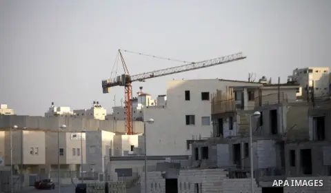 A construction site is seen in Pisgat Zeev, an urban settlement in an area Israel annexed to Jerusalem after the 1967 Middle East war, near the Arab village of Beit Hanina, North Jerusalem, October 29, 2013. The PLO deni...